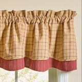 Simmons plaid layered valance 72 inches wide in tan, cream, light brown, and barn red hanging on farmhouse window close up
