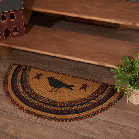 Heirloom Farm Primitive Crow Half Circle Rug styled at base of wooden staircase with primitive crow and star stencil on mustard tan jute braid