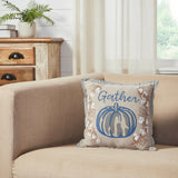 Ashlynn Gather Pumpkin Pillow 12" propped on a neutral linen sofa in a farmhouse living room with shiplap wall and wood dresser