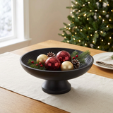 Black Ribbed Wooden Bowl styled as a Christmas centerpiece