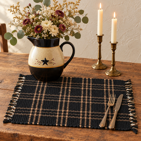 Bridgeton Black Chindi Placemat with Blackberry Pitcher, florals, and candles