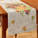 Cornucopia Fall Table Runner 36" with autumn design featuring leaves and fruits on a wooden table.
