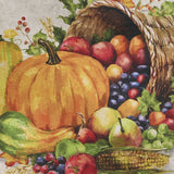 Cornucopia Fall Table Runner 54" Cornucopia filled with fruits, vegetables, and a pumpkin on a fabric background c loseup