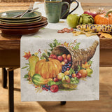 Table setting with Cornucopia Fall Table Runner 54" featuring pumpkins, cornucopia, and fruits on a wooden table.