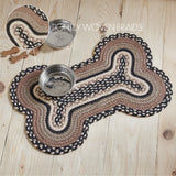 Farmstead Charcoal Dog Bone Braided Waterproof Rug Mat on pine wood floor with stainless bowl and tightly woven braids callout inset highlighting recycled PET construction
