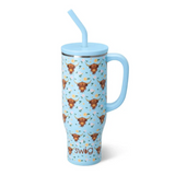Blue tumbler with highland cow design and straw on a white background
