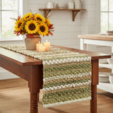 Pear Grove Chindi Table Runner styled on a farmhouse wood dining table with sunflowers and pillar candles in a farmhouse shiplap kitchen
