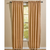 Simmons plaid long panel curtains set of 2 in tan, cream, light brown, and barn red hanging in a farmhouse living room
