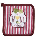 A square wine-themed pot holder or quilt featuring a red and white vertical striped pattern, a dark burgundy border, and a central white label with the text 'it's WINE o'clock' and an illustration of a glass of white wine with grape leaves.