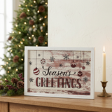 Season’s Greetings Ornaments Sign in a Christmas console-table setting