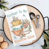Vintage Is My Favorite Color Flour Sack Towel features the phrase "Vintage Is My Favorite Color" and vintage pyrex bowls, beautiful pink flowers, and a vintage chicken hen on nest.