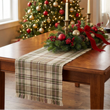 Caraway Table Runner with festive red-and-gold Christmas accents and lit candles