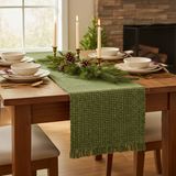 Square Christmas tablescape featuring the sage green table runner