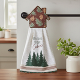 Square lifestyle image of the Log Cabin kitchen towel in a white country kitchen