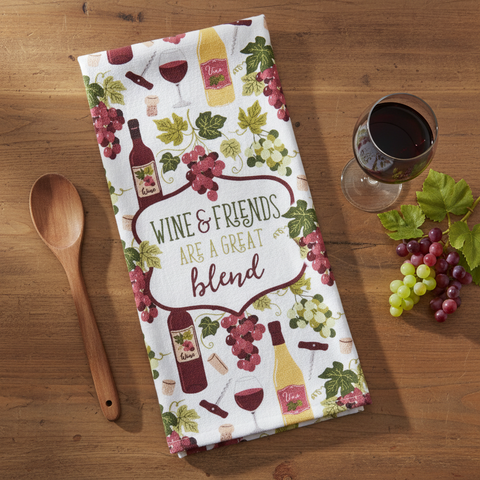 Wine & Dine Friends Blend Terry Towel on a wood table with wood spoon, glass of wine and grapes